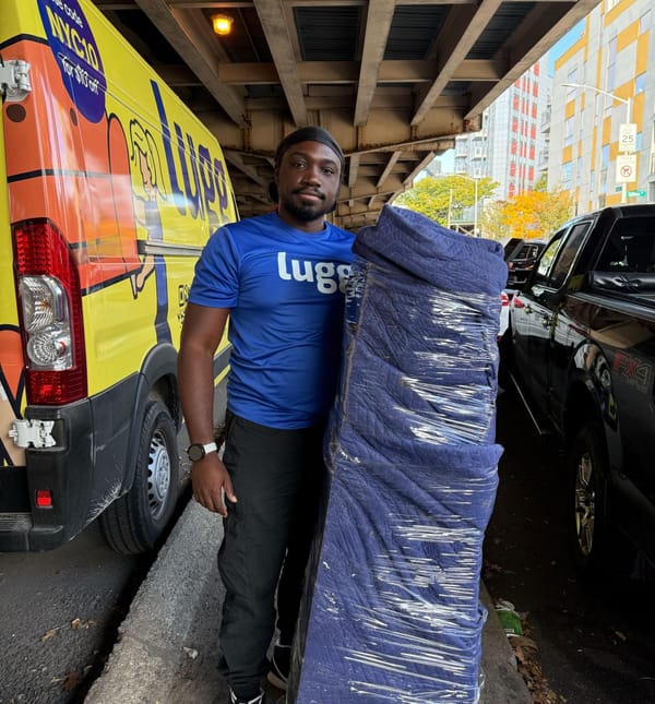 Lugg mover wrapping and protecting furniture during transport as an alternative to renting a U-Haul.